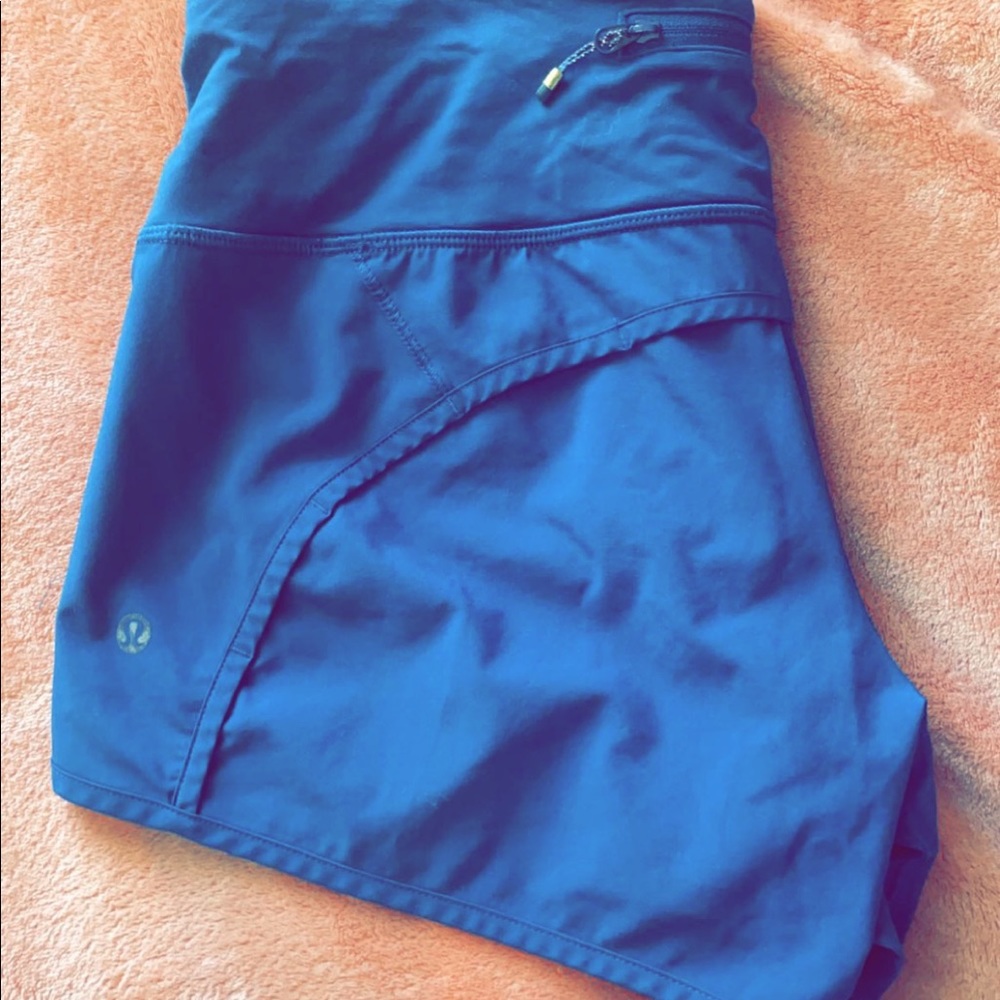 LULULEMON size 6 2.5 blue speed ups